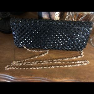 Black faux spike studded clutch